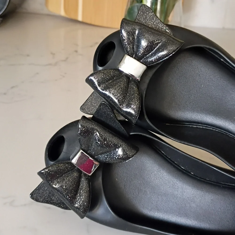 Melissa Black Flats with Metallic Bow